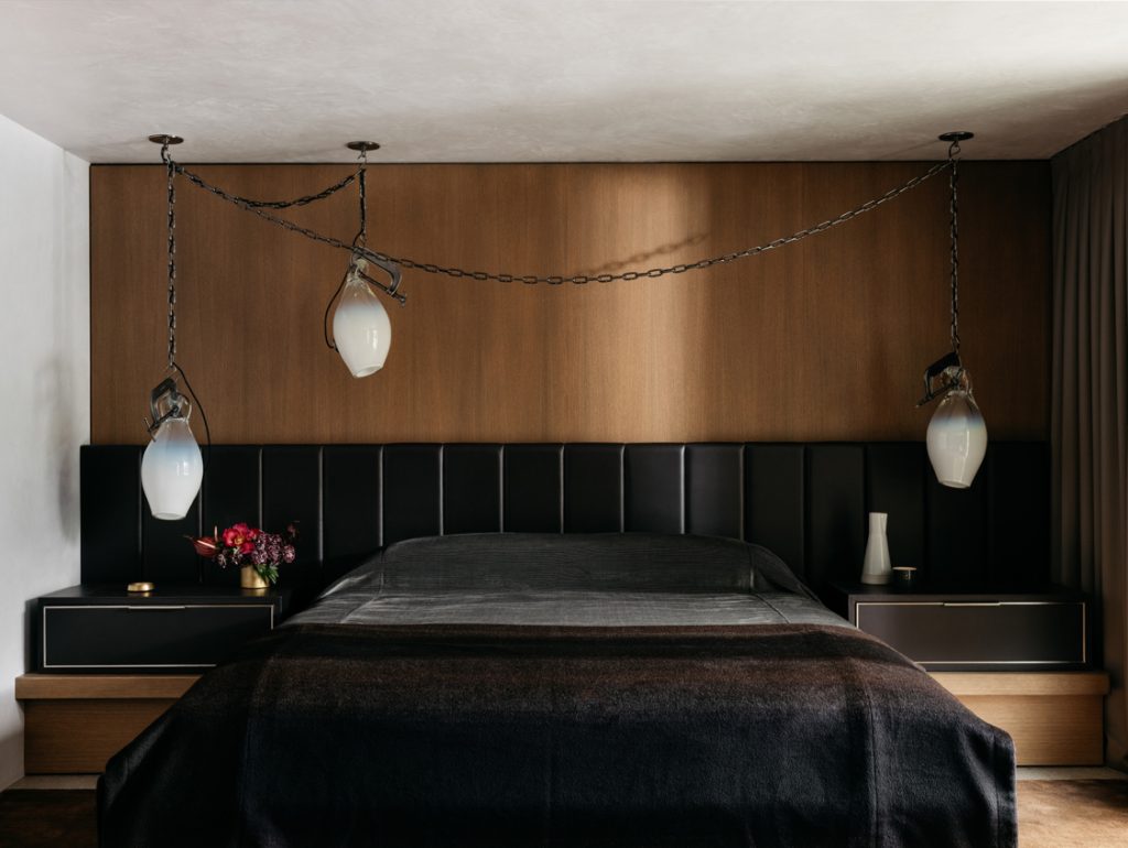 Unique Bedroom Decor: Contemporary Ideas To Dazzle, modern bedroom in black and dark tones with wooden wall and side tables home inspiration ideas home inspiration ideas