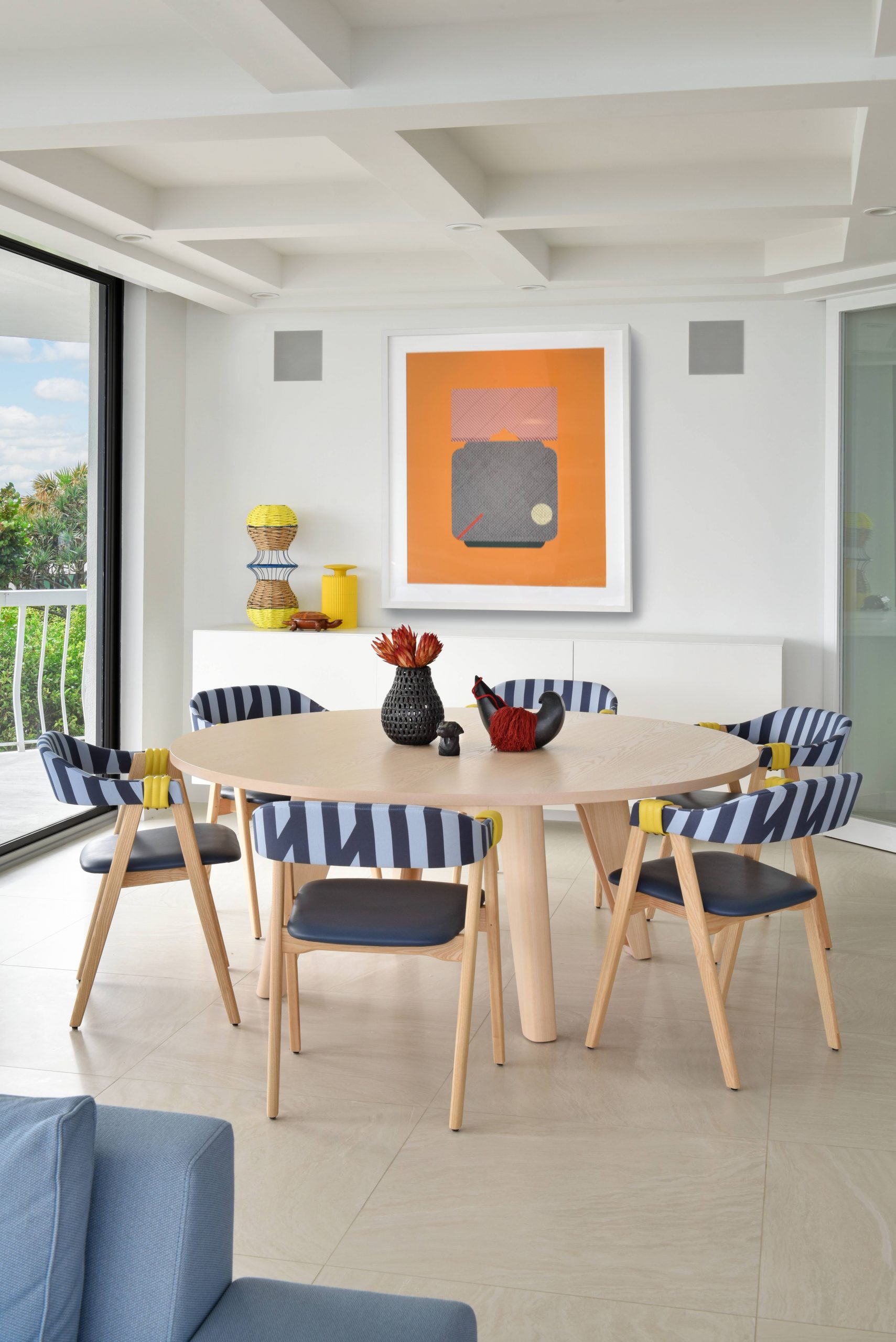 Colorful contemporary dining room design with irreverent artwork on the wall - Ghislaine Viñas: Discover Her Radical Design World  Ghislaine Viñas: Discover Her Radical Design World Ghislaine Vinas The Radicalist Design World PB DiningRoom scaled